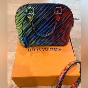 Louis Vuitton shoulder and hand bag. Only a few in the world. Multi color.